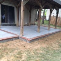 Concrete Patio with Stone Face and Brick Borders in Dale City, VA - Wright's Concrete