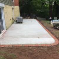 Concrete Patio with Brick Borders in Herndon, Virginia - Wright's Concrete