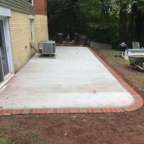Concrete Patio with Brick Borders in Herndon, Virginia - Wright's Concrete