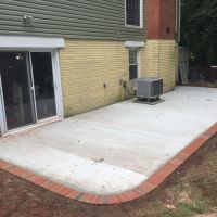 Concrete Patio with Brick Borders in Herndon, Virginia - Wright's Concrete