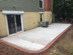 Concrete Patio with Brick Borders in Herndon, Virginia - Wright's Concrete