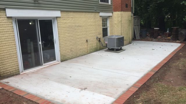 Concrete Patio with Brick Borders in Herndon, Virginia - Wright's Concrete