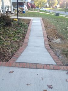 Concrete Driveway and Brick Lined Path in Reston, VA - Wright's Concrete