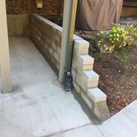 Concrete Driveway, Sidewalk, Concrete Patio with Brick Borders, Retaining Wall in Springfield VA - Wright's Concrete