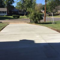 Concrete Driveway, Sidewalk, Concrete Patio with Brick Borders, Retaining Wall in Springfield VA - Wright's Concrete