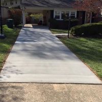 Block Wall and Exposed Aggregate Patio with Concrete Driveway in Vienna, VA - Wright's Concrete